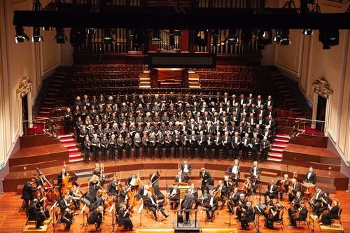 overhead picture of a full orchestra and choir in  a concert. hall / auditorium