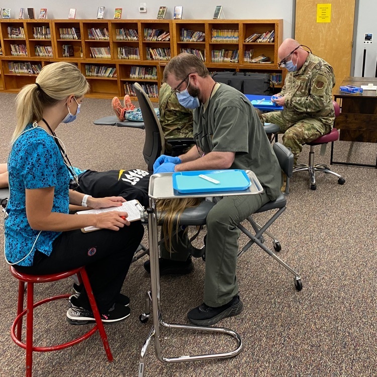 Students getting dental care